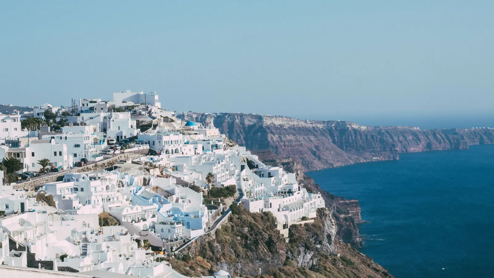 The white terraces of Imerovigli stepping down the caldera cliff